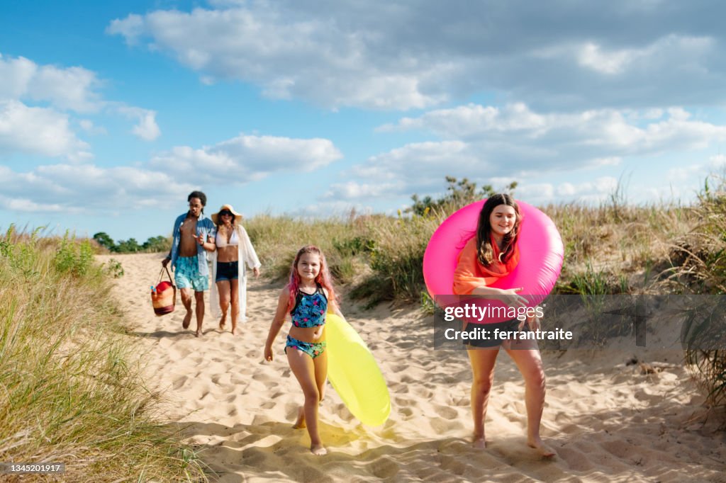 Family arriving at the beach