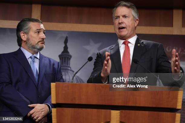 Sen. Roger Marshall speaks Sen. Ted Cruz listens during a news conference at the U.S. Capitol October 6, 2021 in Washington, DC. Senate Republicans...