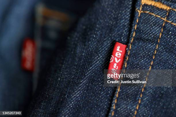 In this photo illustration, a view of a label on a pair of Levi's jeans on October 06, 2021 in San Francisco, California. Levi Strauss reported third...