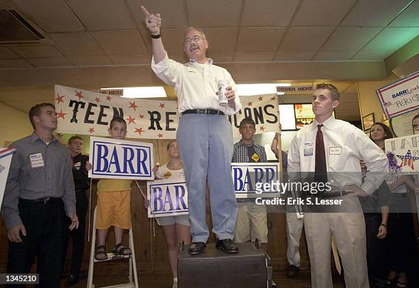 Congressman Bob Barr addresses supporters at Slope's Barbeque August 4, 2002 in Woodstock, Georgia. Barr is running for re-election against fellow...