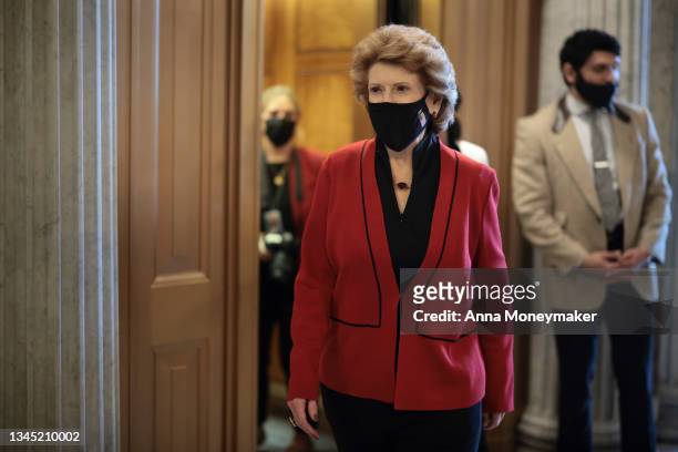 Sen. Debbie Stabenow arrives to the Senate Chambers for a series of votes in the U.S. Capitol Building on October 06, 2021 in Washington, DC....