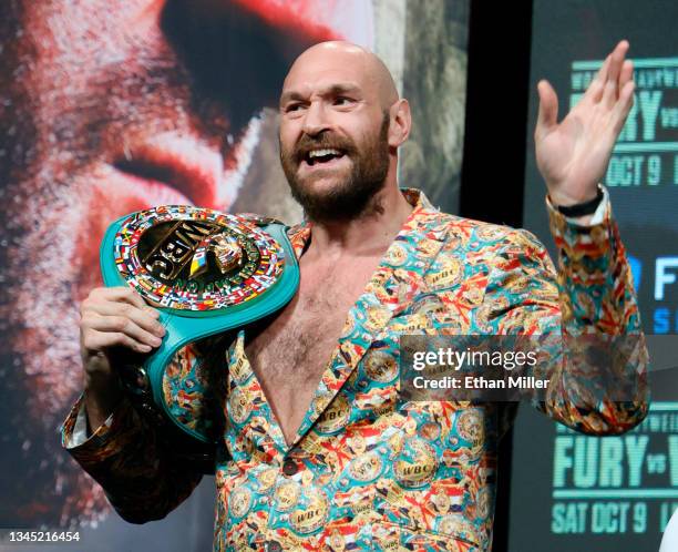 Heavyweight champion Tyson Fury gestures during a news conference at MGM Grand Garden Arena on October 6, 2021 in Las Vegas, Nevada. Fury will defend...