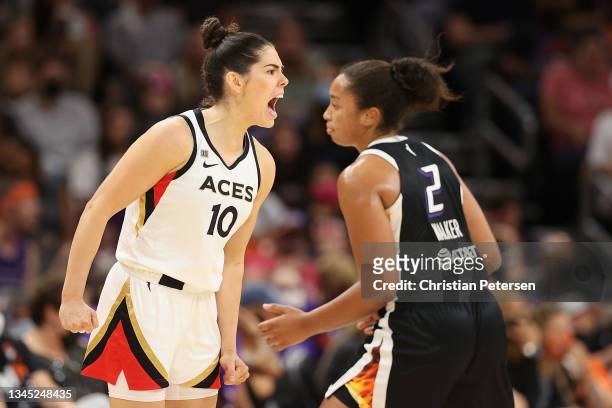 Kelsey Plum of the Las Vegas Aces celebrates after a three-point shot over Megan Walker of the Phoenix Mercury during the second half in Game Four of...