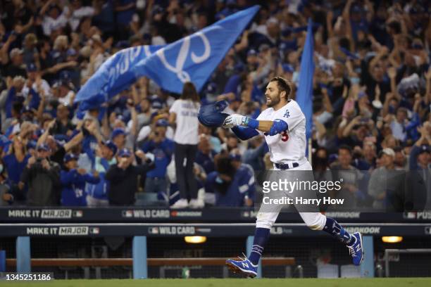 Chris Taylor of the Los Angeles Dodgers celebrates his walk off two-run home run in the ninth inning to defeat the St. Louis Cardinals 3 to 1 during...