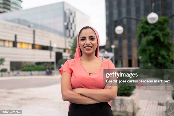 cancer woman scarf with crossed arms, latin woman - woman hand crossed stockfoto's en -beelden