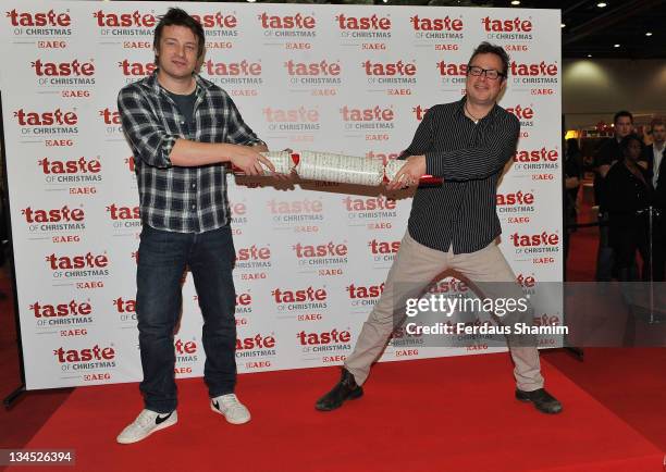 Jamie Oliver and Hugh Fearnley- Whittingstall attend the opening of Taste Of Christmas Food And Drink Festival at ExCel on December 2, 2011 in...
