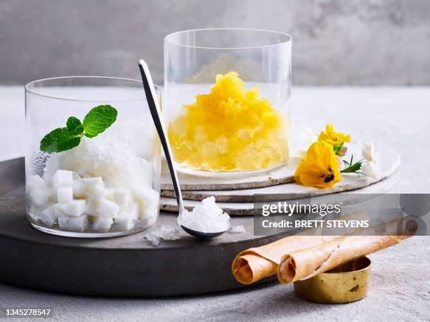 coconut and mango granita - mango coconut stock-fotos und bilder