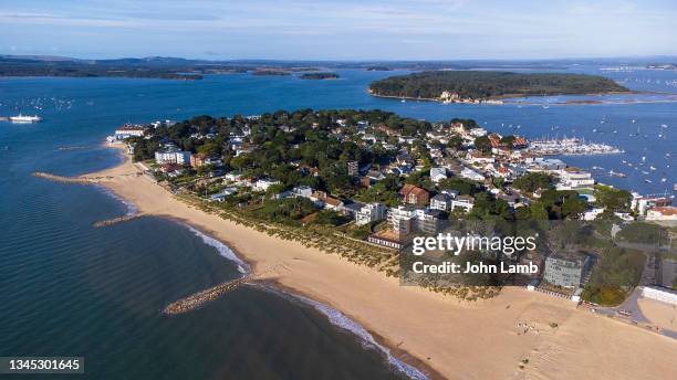 aerial view of sandbanks peninsula and poole harbour. - dorset fotografías e imágenes de stock