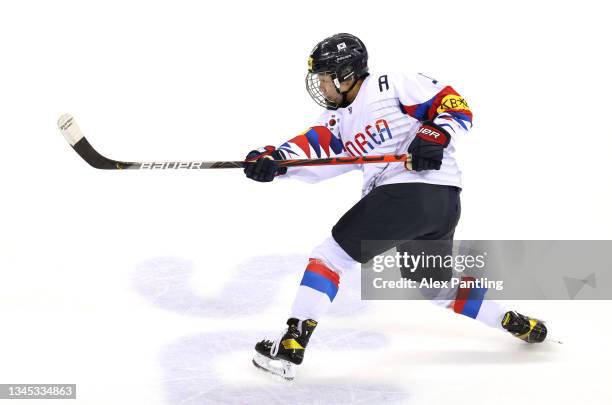 Heewon Kim of Team Korea shoots during the Women's Ice Hockey - Beijing 2022 Olympic Qualifying match between Korea and Slovenia at Motorpoint Arena...