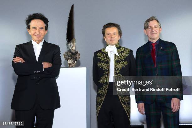 Jack lang, Jean-Michel Othoniel and Johan Creten, who has created the sword, attend French Artist Jean-Michel Othoniel receives the Academician Sword...