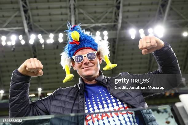 France fan in fancy dress gestures prior to the UEFA Nations League 2021 Semi-final match between Belgium and France at Juventus Stadium on October...
