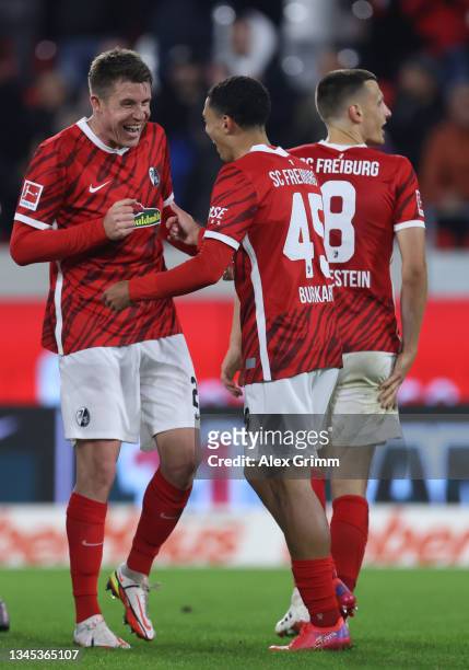 Nishan Burkart of Freiburg celebrates his team's third goal with teammate Dominique Heintz during the friendly match between SC Freiburg v FC St....