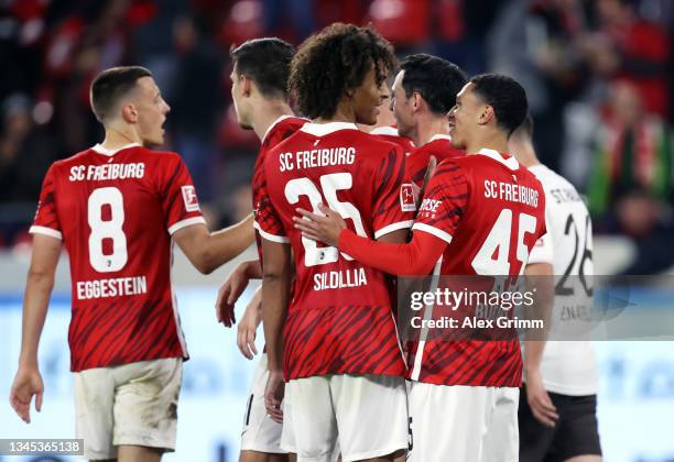 Nishan Burkart of Freiburg celebrates his team's third goal with teammate Kiliann Sildilla during the friendly match between SC Freiburg v FC St....