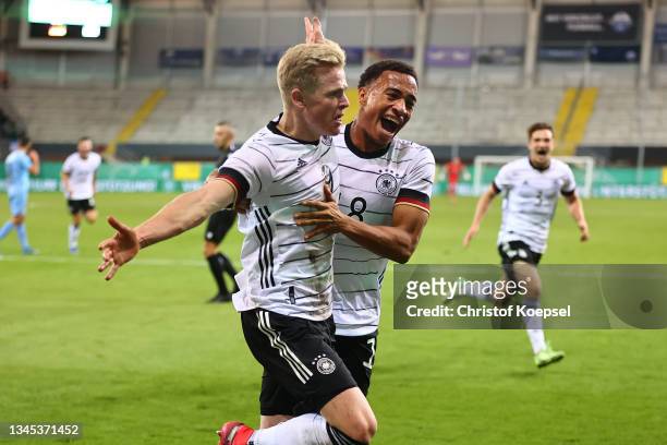 Jonathan Burkardt of Germany celebrates the third goal to 3-2 with Jamie Leweling of Germany during the 2022 UEFA European Under-21 Championship...