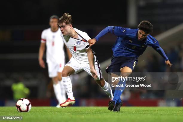 Lewis Bate of England is challenged by Giuessepe Leone of Italy during the U20 International match between England and Italy at Technique Stadium on...