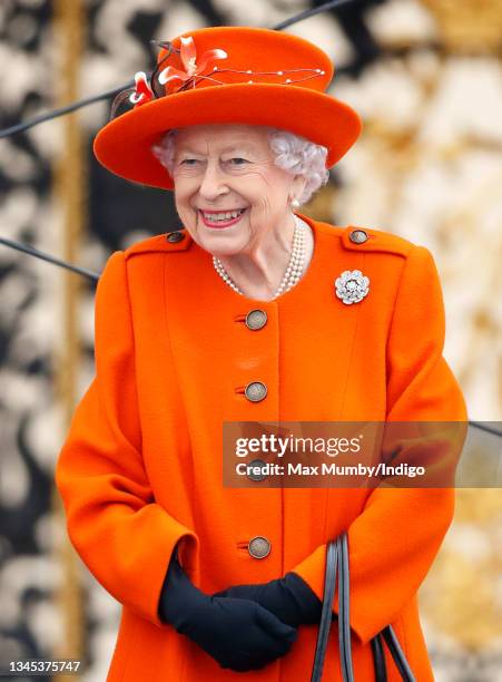 Queen Elizabeth II , wearing her Nizam of Hyderabad diamond rose brooch, attends the launch of the Queen's Baton Relay for Birmingham 2022, the XXII...