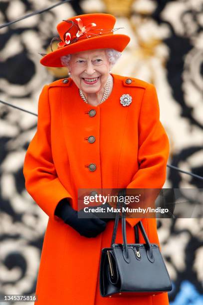 Queen Elizabeth II , wearing her Nizam of Hyderabad diamond rose brooch, attends the launch of the Queen's Baton Relay for Birmingham 2022, the XXII...