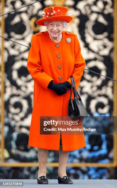 Queen Elizabeth II attends the launch of the Queen's Baton Relay for Birmingham 2022, the XXII Commonwealth Games at Buckingham Palace on October 7,...