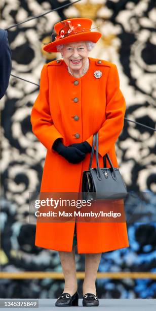 Queen Elizabeth II attends the launch of the Queen's Baton Relay for Birmingham 2022, the XXII Commonwealth Games at Buckingham Palace on October 7,...