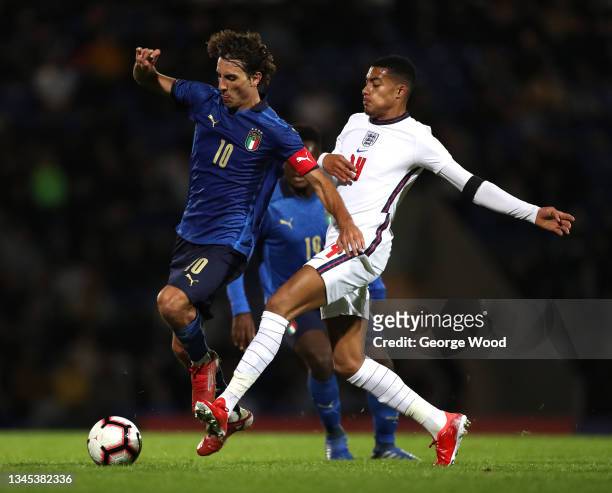 Alessandro Cortinovis of Italy is challenged by Miguel Azeez of England during the U20 International match between England and Italy at Technique...