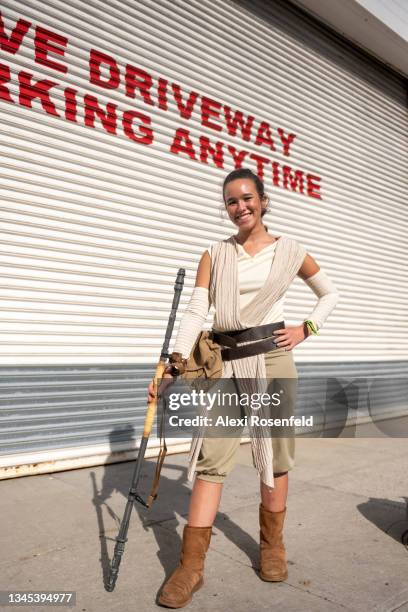 Cosplayers dressed as Rey from Star Wars poses outside Day 1 of New York Comic Con at Javits Center on October 07, 2021 in New York City. Comic Con...