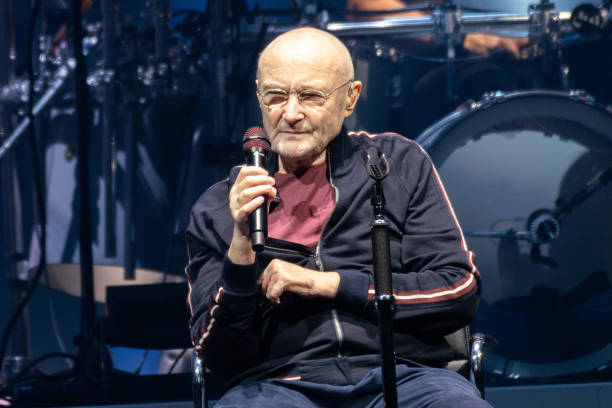 Phil Collins of Genesis performs on stage "The Last Domino Tour" at The SSE Hydro on October 07, 2021 in Glasgow, Scotland.