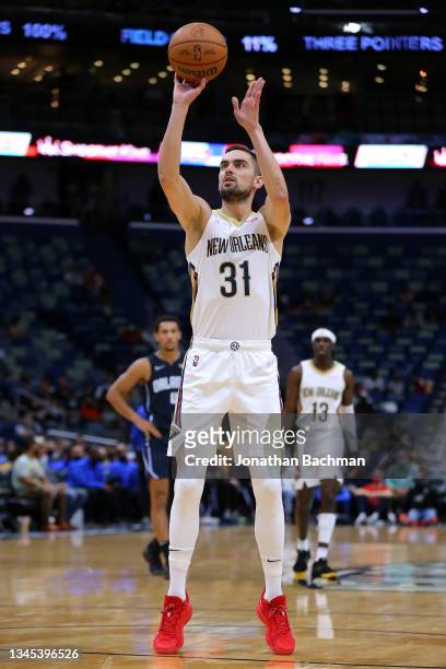 Tomas Satoransky of the New Orleans Pelicans shoots during a preseason game at the Smoothie King Center on October 06, 2021 in New Orleans,...