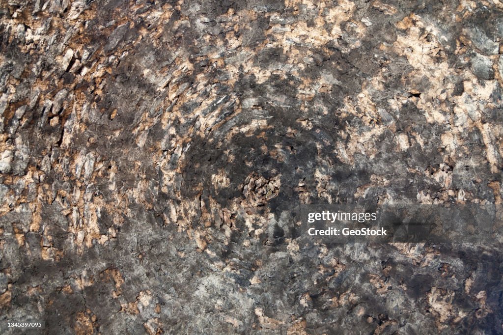 Burnt charcoal stains, inside looking up at ceiling of domed beehive-style kiln