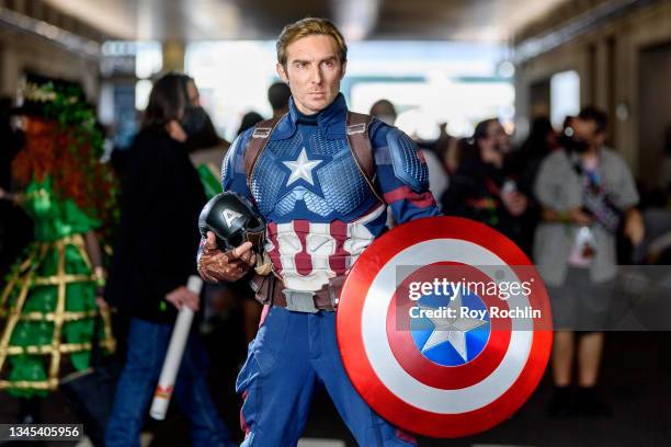 Cosplayer dressed as Captain America from "The Avengers" and the Marvel Universe during the first day of Comic Con at Javits Center on October 07,...