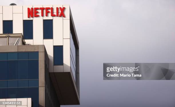 The Netflix logo is displayed at Netflix's Los Angeles headquarters on October 07, 2021 in Los Angeles, California. The IATSE union which represents...