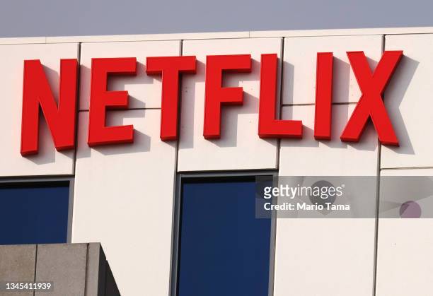 The Netflix logo is displayed at Netflix's Los Angeles headquarters on October 07, 2021 in Los Angeles, California. The IATSE union which represents...