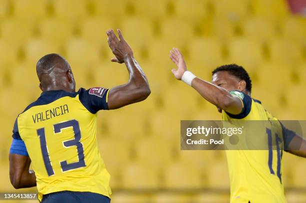 Enner Valencia of Ecuador celebrates with teammate Gonzalo Plata after scoring the second goal of his team during a match between Ecuador and Bolivia...