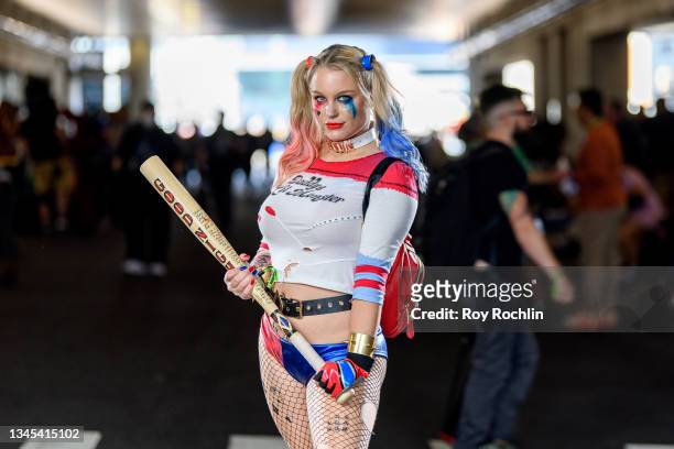 Cosplayer is dressed as Harley Quinn from "Batman" and the DC Universe during the first day of Comic Con at Javits Center on October 07, 2021 in New...