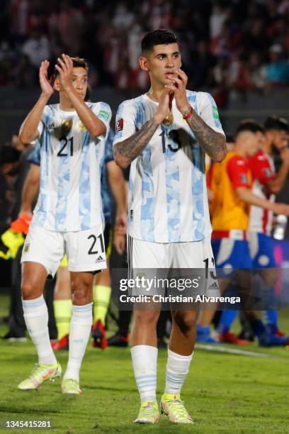 Cristian Romero of Argentina greets the fans after a match between Paraguay and Argentina as part of South American Qualifiers for Qatar 2022 at...