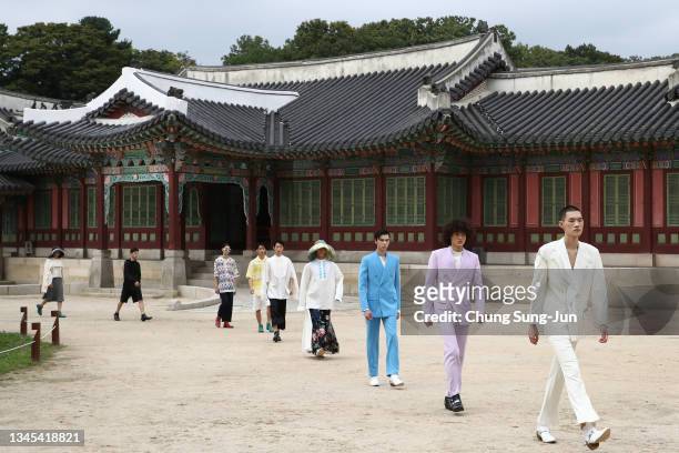 In this image released on October 08 models showcase designs by CASUSO on the runway as a part of Seoul Fashion Week 2022 SS at Changgyeong Palace on...