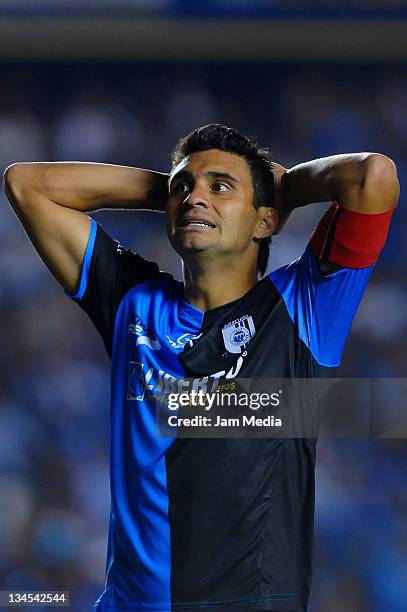 Carlos Bueno of Queretaro reacts during a semi final match as part of the Apertura 2011 at the Corregidora Stadium in Queretaro, Mexico on December...