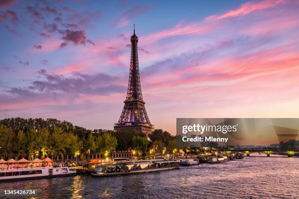 eiffel tower paris river seine sunset twilight france - tour eiffel stockfoto's en -beelden