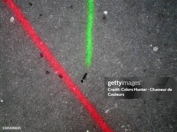 colorful and saturated lines painted on asphalt in paris - marquage de route photos et images de collection