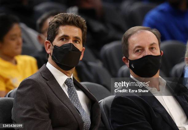 Golden State Warriors general manager Bob Myers and owner Joe Lacob watch their team play the Denver Nuggets at Chase Center on October 06, 2021 in...