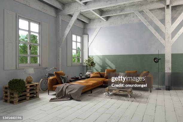 industrial style living room with leather corner sofa, bicycle and potted plant - leather industry stock pictures, royalty-free photos & images