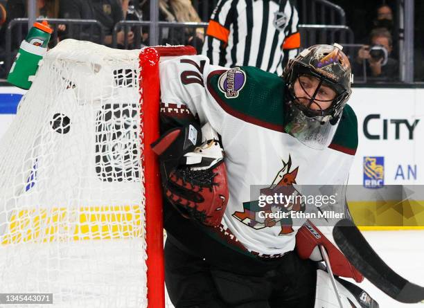 Shot by William Karlsson of the Vegas Golden Knights gets by Karel Vejmelka of the Arizona Coyotes for a second-period power-play goal during their...