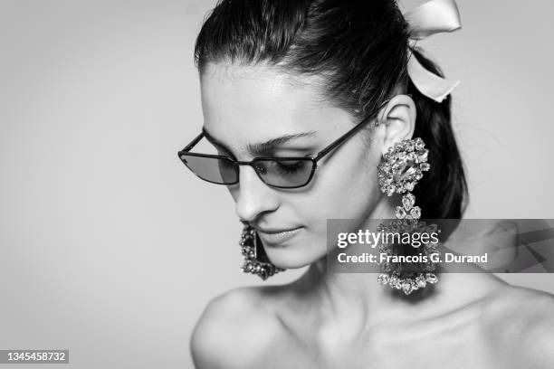 Model poses backstage ahead of the Giambattista Valli Womenswear Spring/Summer 2022 show as part of Paris Fashion Week on October 04, 2021 in Paris,...