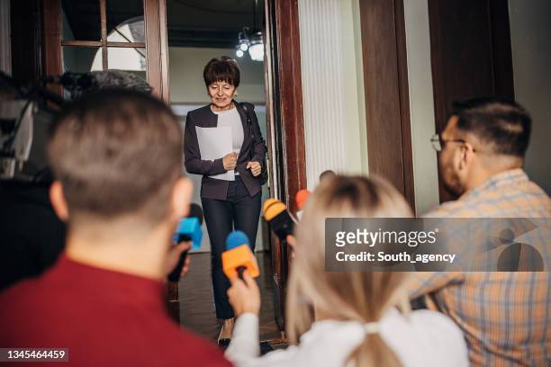 press waiting for politician - female politicans stock pictures, royalty-free photos & images