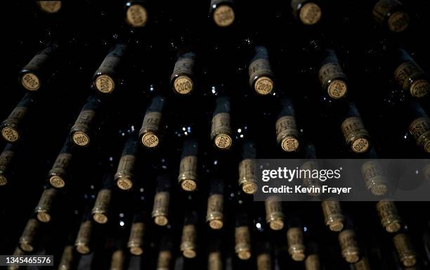 Bottles of wine are seen in the cave at the Silver Heights Winery on September 16, 2021 at the edge of the Helan Mountains in Jin Shan, Ningxia Hui...