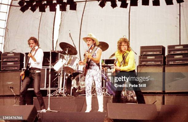 Jim Lea, Dave Hill and Noddy Holder of British band Slade perform on stage at The Monsters of Rock Festival, Donington Park, on August 22nd 1981 in...