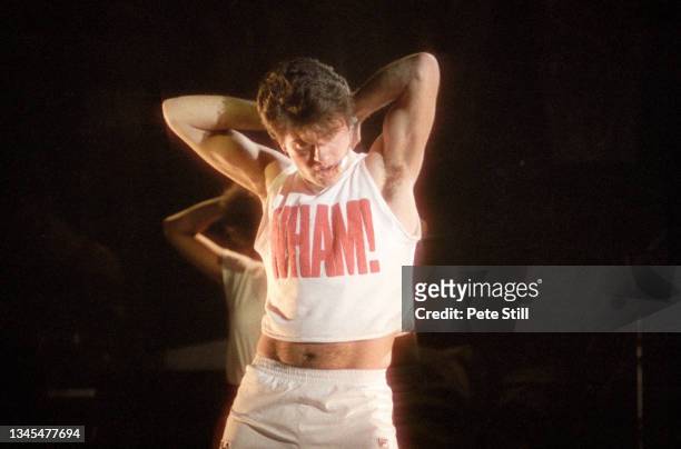 George Michael of English pop duo Wham performs on stage at Hammersmith Odeon on October 28th, 1983 in London, United Kingdom.