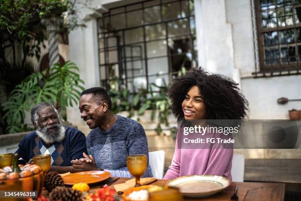 family reunited on the table for thanksgiving at home - november 19 stock pictures, royalty-free photos & images