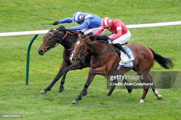 James Doyle riding Fast Attack win The Godolphin Lifetime Care Oh So Sharp Stakes from Jim Crowley and Allayaali at Newmarket Racecourse on October...