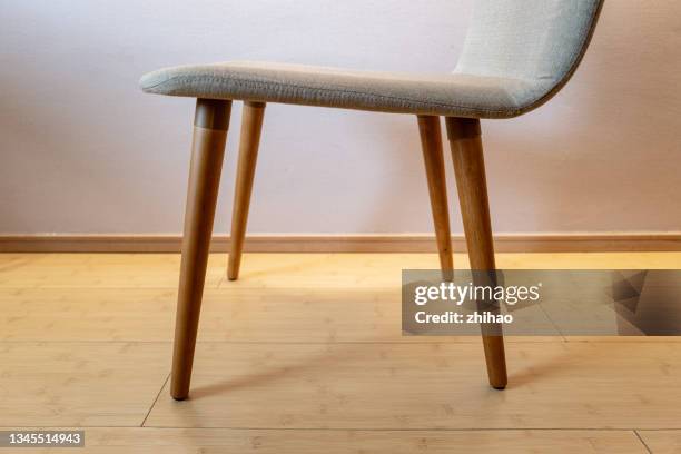 look at the foot of the chair from a low angle - wooden floor low angle stock pictures, royalty-free photos & images