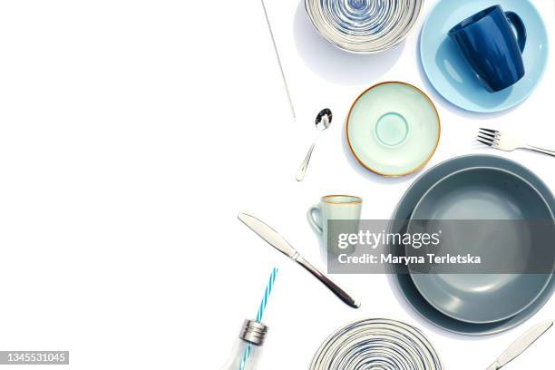 flat lay with utensils on a white background. - confetti light blue background stock pictures, royalty-free photos & images